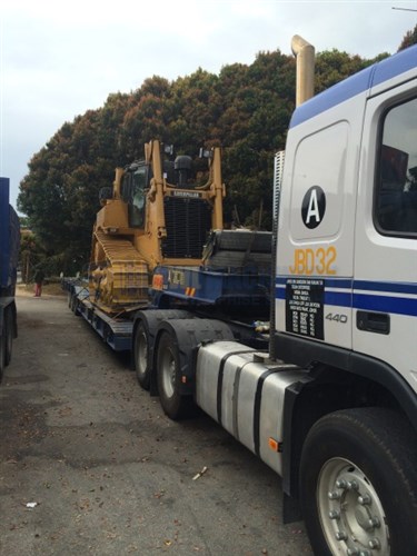 4 Axle Low-Loader - delivering bull dozer